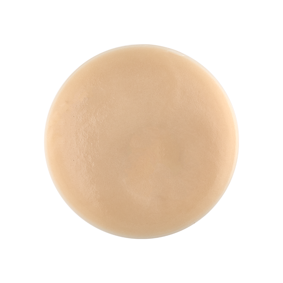Sleepy. A perfectly circular swatch of a pale beige, matte, toothpaste.