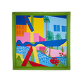 Summer Daydreams. A square knot wrap with a green border. The design is bold, abstract colours creating a vibrant city theme.
