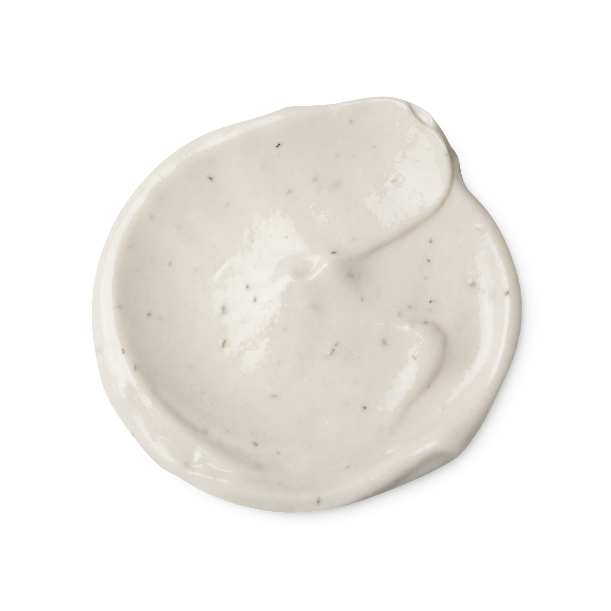 A swatch of light cream coloured Sympathy for the Skin body lotion, with tiny dark brown flecks, which are vanilla pod seeds.