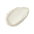 T For Toes. A neatly smudged swatch of white, ultra-fine, foot powder.