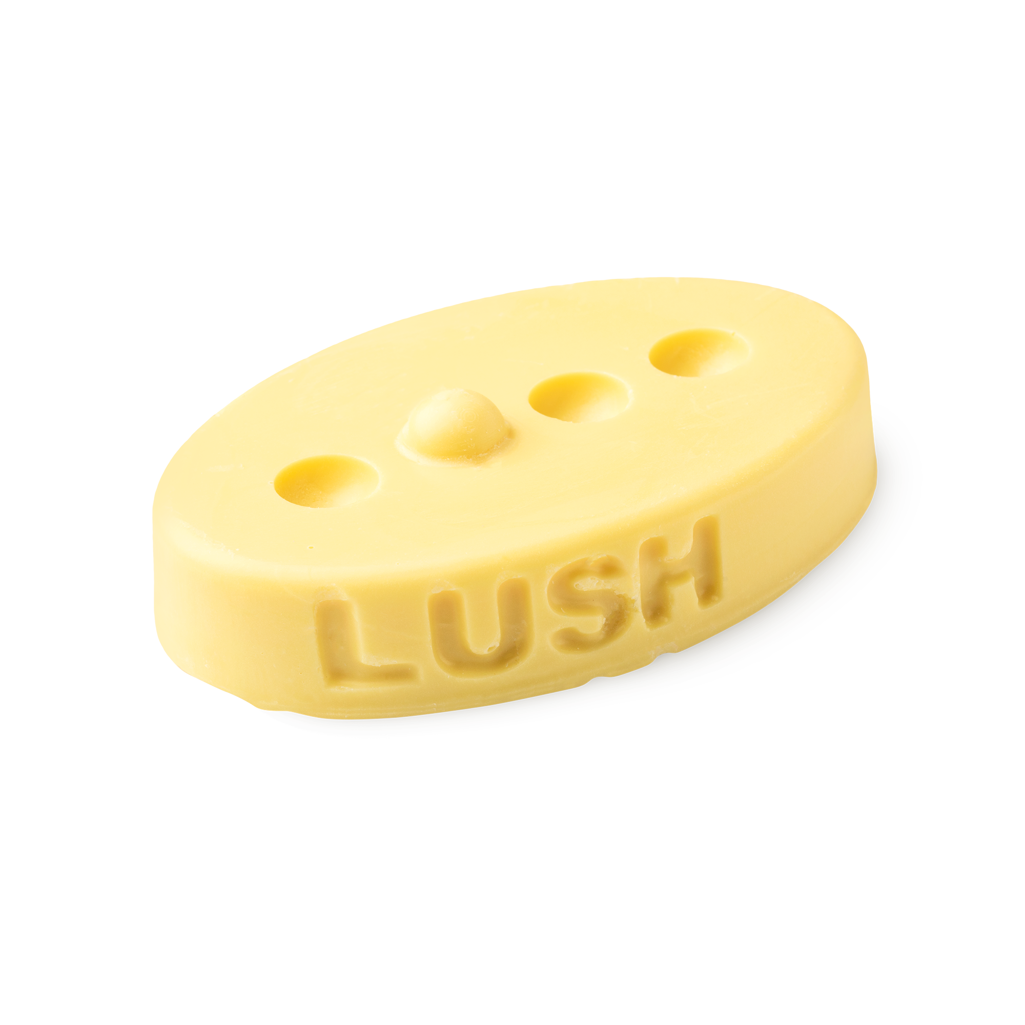 Therapy. A buttery yellow, oval shaped, solid massage bar, with a design of 3 small holes cut out with 1 bump in a line.