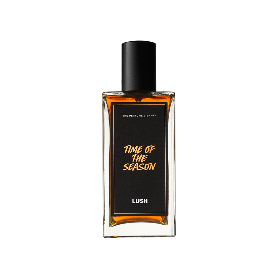 Time Of The Season. A rectangular, glass perfume bottle with a black cap is filled with translucent,deep-amber liquid. A black label reads 'Time Of The Season'.
