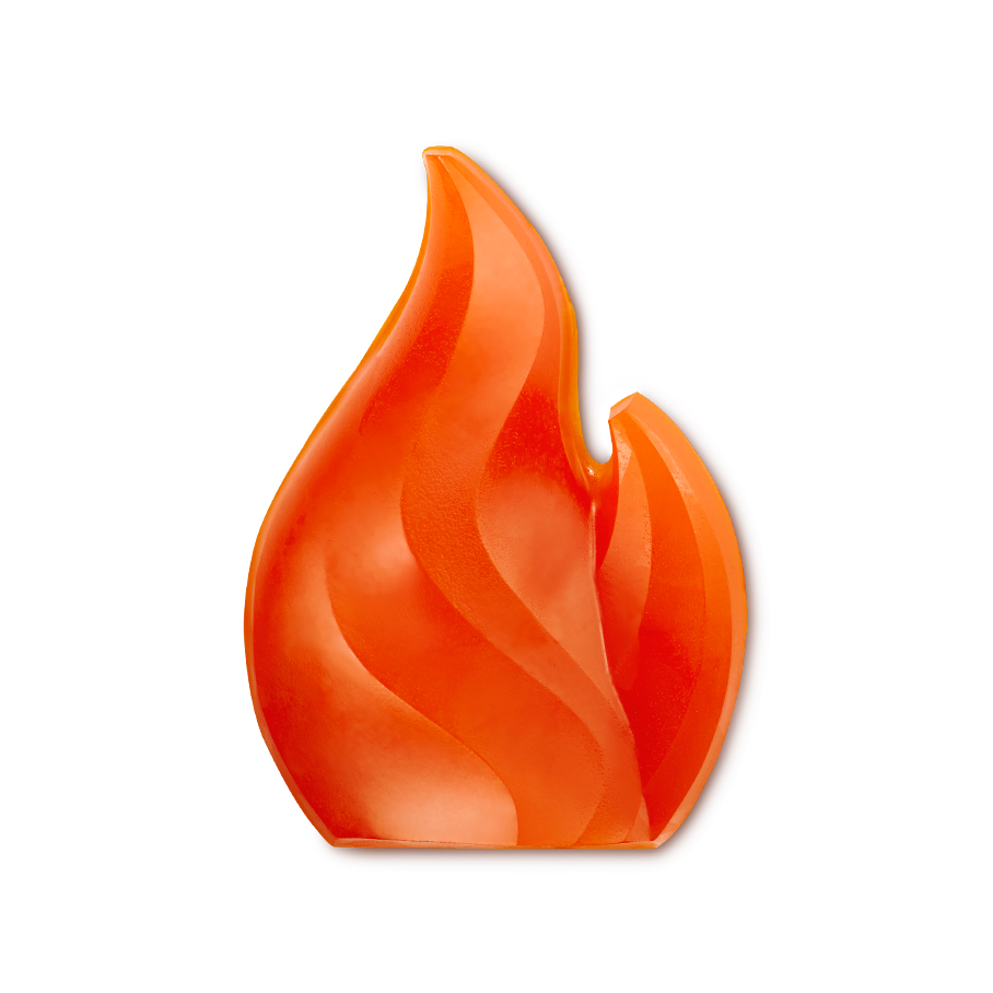 Warming shower gummy. A smooth, vibrant orange shower gummy is sculpted into the shape of a flickering fire flame. The translucent structure features elegant, curved ridges that mimic a burning fire.