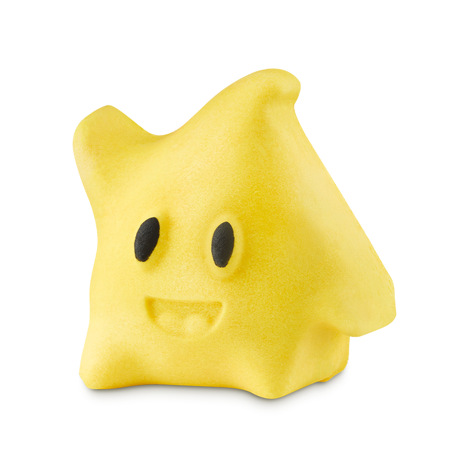 A yellow, star-shaped bubble bar modeled after a Luma from Super Mario. It has small black eyes and a carved smiling mouth.