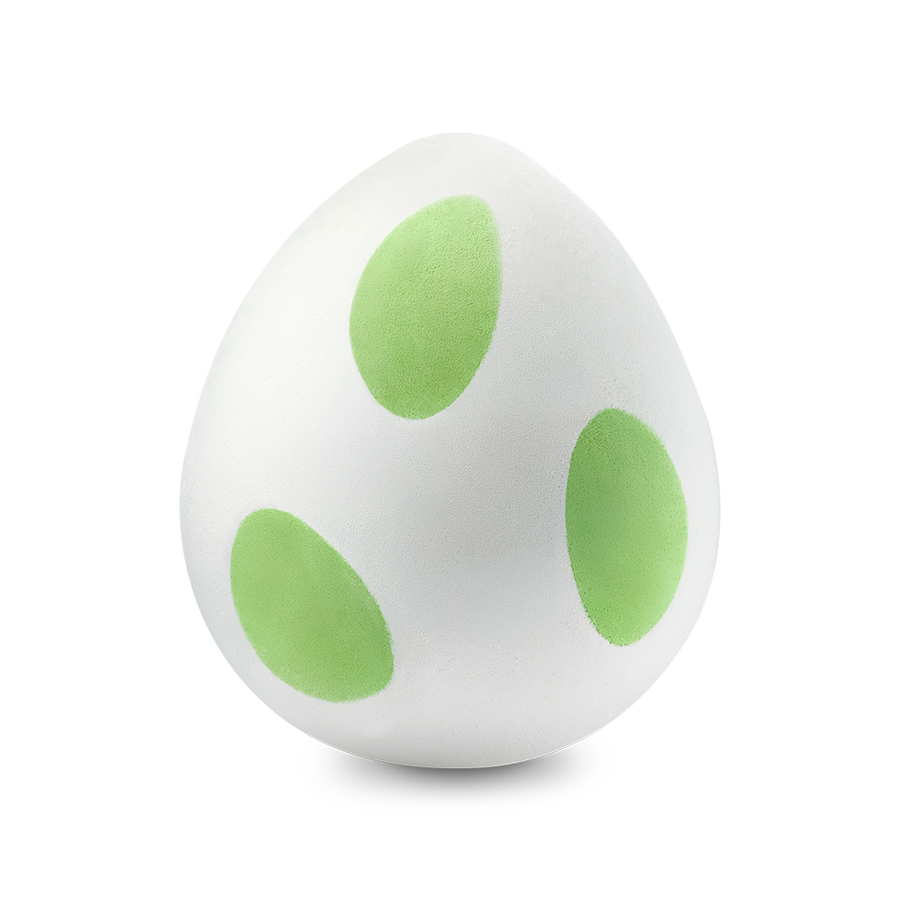 The Yoshi Egg a white egg-shaped bath bomb with three lime-green oval spots.